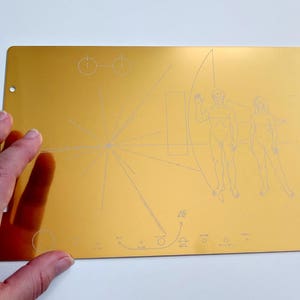 Full size metal replica of NASA Pioneer Plaque, laser engraved and laser cut from golden aluminum. Two colour options to choose from image 9