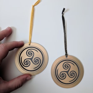 Hellblade: Senua's Sacrifice Christmas tree ornament, metallic gold, laser engraved Christmas tree hanging decoration.
