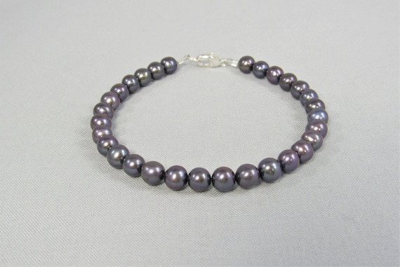 Grey Iridescent Colorful 8.5mm Round Bead Stretch Bracelet Grey Iridescent Colorful 8.5mm Round Bead Stretch Bracelet