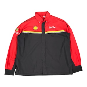 May include: A red and black long-sleeve work shirt with a Shell logo and the text "Helix" on the front. The shirt also has a Ferrari logo with the text "Official Partner" on the left sleeve.