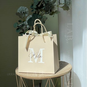 Bolsa de regalo de embalaje color crema con personalización, bolsa de joyería de marca personalizada, bolsa de papel para compras con lazo, bolsas de regalo para el día de la boda 50 piezas