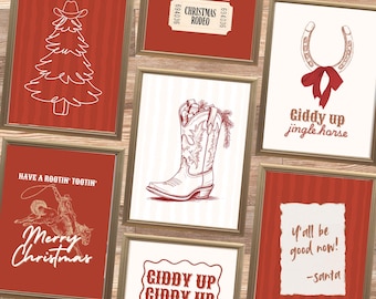 May include: A collection of framed Christmas-themed art prints. Designs include a cowboy boot, Christmas tree, horseshoe, and rodeo tickets. Text includes "Merry Christmas", "Giddy Up", and "Y'all be good now!"