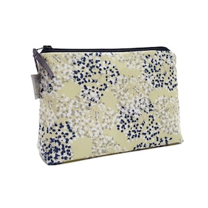 Cosmetic bag with scattered flowers water-repellent inside practical size for your handbag image 1