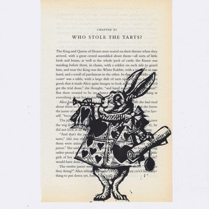 Impresión de libro de conejo blanco