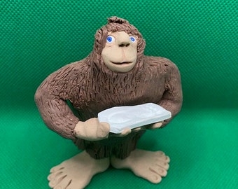 Bigfoot Holding a Human Foot Cast Polymer Clay Figure Polymer Cryptid