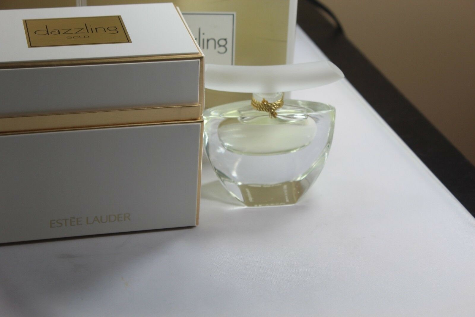 Buy DAZZLING Gold 0.37oz 11 Ml Parfum for Women by Estee Lauder