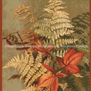 Puede incluir: Un patrón de punto de cruz en descarga digital PDF que presenta una ilustración botánica de helechos y hojas de otoño en tonos verdes, dorados y rojos intensos sobre un fondo oliva. El texto dice PDF Digital Download Cross Stitch Pattern.