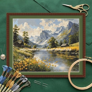 May include: A cross stitch pattern featuring a mountain landscape with a river, yellow wildflowers, and two small cabins under a cloudy sky. The text https://www.etsy.com/uk/shop/CelticRoseXStitch is printed across the center of the image.