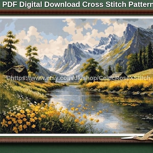 May include: A digital cross stitch pattern featuring a landscape with a river flowing through a valley, yellow wildflowers in the foreground, green trees, and snow-capped mountains under a cloudy sky. Includes two embroidery floss bobbins and scissors.