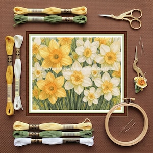 May include: A set of three ceramic mugs with a speckled, matte finish. Each mug features a different color: light blue, cream, and gray. The mugs have a simple, modern design and a comfortable handle.