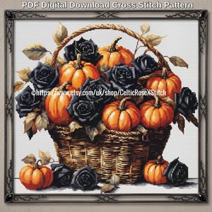 May include: A PDF digital download cross stitch pattern featuring a woven basket filled with orange pumpkins and black roses, with additional pumpkins and roses at the base. The text PDF Digital Download Cross Stitch Pattern is at the top.