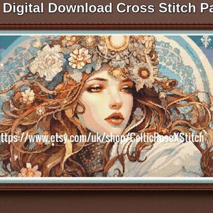 Op de afbeelding: Een PDF digitaal download kruissteekpatroon met een portret van een persoon met lang golvend bruin haar versierd met bloemen, tegen een cirkelvormige blauwe achtergrond. De tekst luidt PDF Digital Download Cross Stitch Pattern.