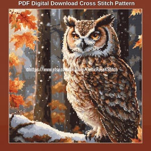May include: A PDF digital download cross stitch pattern featuring a pixelated great horned owl perched on a snowy branch in an autumn forest with orange leaves and falling snow. The text reads PDF Digital Download Cross Stitch Pattern.