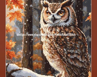 May include: A PDF digital download cross stitch pattern featuring a pixelated great horned owl perched on a snowy branch in an autumn forest with orange leaves and falling snow. The text reads PDF Digital Download Cross Stitch Pattern.