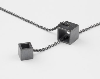 Necklace Interlocked Cubes Silver geometric Pendant black