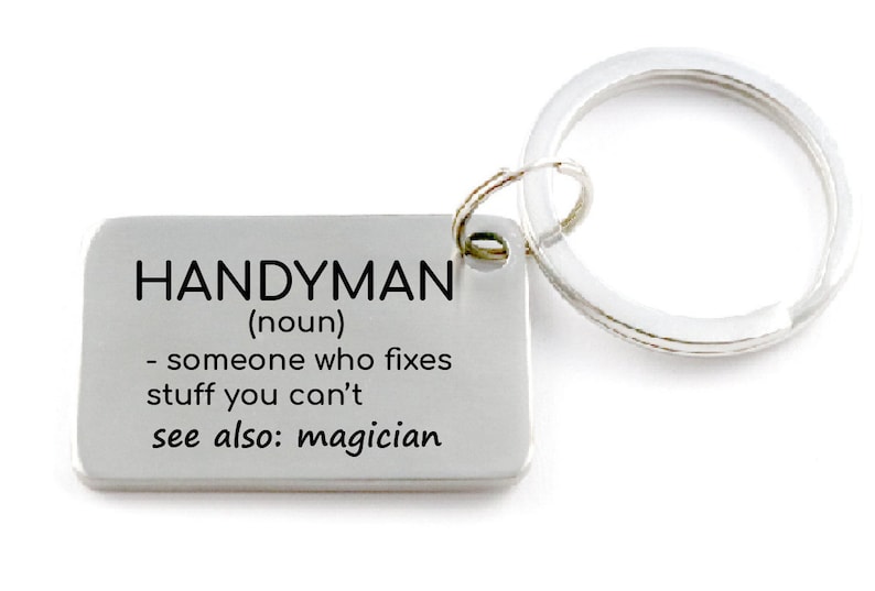 May include: Silver keychain with a rectangular tag that reads "HANDYMAN (noun) - someone who fixes stuff you can't see also: magician"