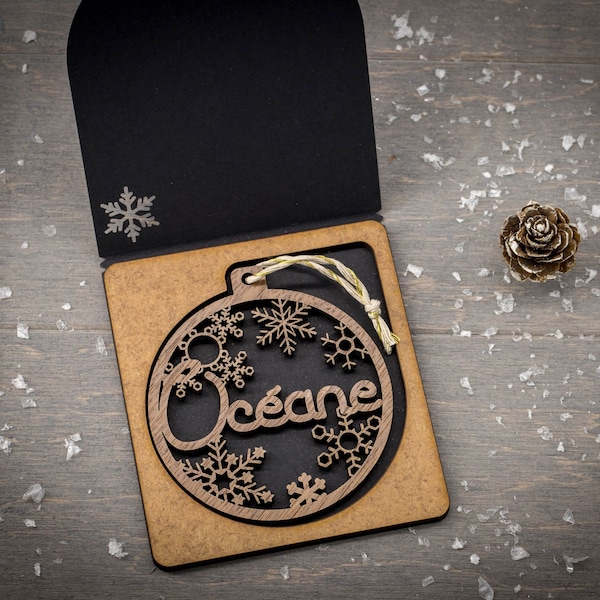 Personalized wooden christmas ball. Laser cut name.