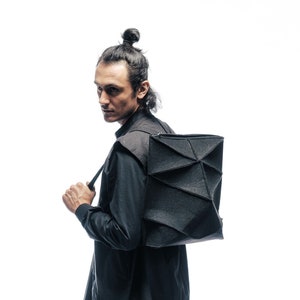 Shielded avantgarde futuristic architectural minimalist genderless geometric urban backpack
