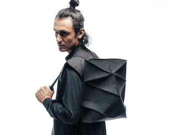 Shielded avantgarde futuristic architectural minimalist genderless geometric urban backpack
