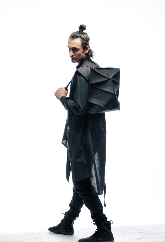 Shielded avantgarde futuristic architectural minimalist genderless geometric urban backpack