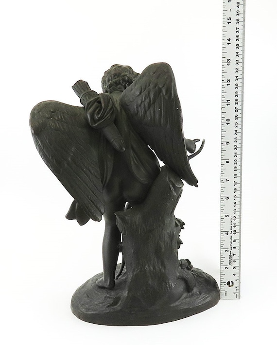 1800 年代中期から後期にかけてのフランスのブロンズ像「弓を