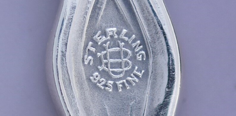 Rare Unger Brothers Sterling Silver Cupid Sunbeams Baby Food Pusher ...