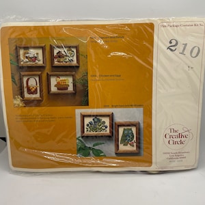 May include: A package containing four embroidery kits from The Creative Circle. The kits are for a popcorn and donuts design, a chicken and eggs design, and two designs featuring bright eyes and wildflowers. The package includes printed cotton/poly fabric, yarns, a needle, and instructions. The finished size of each design is 5 inches by 7 inches.