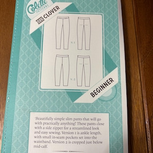 May include: A Colette Patterns 1019 Clover sewing pattern envelope in teal with a white geometric background. The front displays line drawings of two pant versions, the text Beginner, and a description of the slim pants with side zippers.