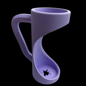 May include: A unique, lavender-colored mug with an unconventional design. The mug features a curved handle and a distinctive, open-bottomed structure with a star-shaped cutout. The design is modern and minimalist, set against a black background.