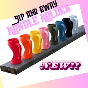 May include: A row of colorful, curved handle holders in red, orange, yellow, pink, green, blue, black, and white. The text "SIP AND SWAY HANDLE HOLDER" is above the holders, and "NEW!!" is below.