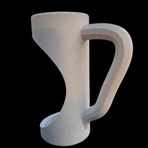 May include: A light gray, textured mug with a unique, curved handle. The mug has a wide, cylindrical body and a rounded base. The handle is thick and angular, extending from the side of the mug.