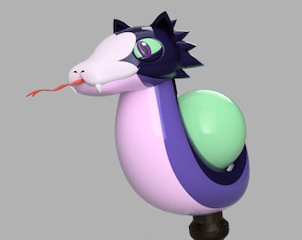 May include: A purple, pink, and green snake toy with a black head and a white face. The snake has a red tongue and a green ball on its tail.