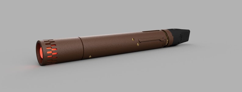 May include: A brown and black cylindrical object with a red light at one end and a black cap at the other end.