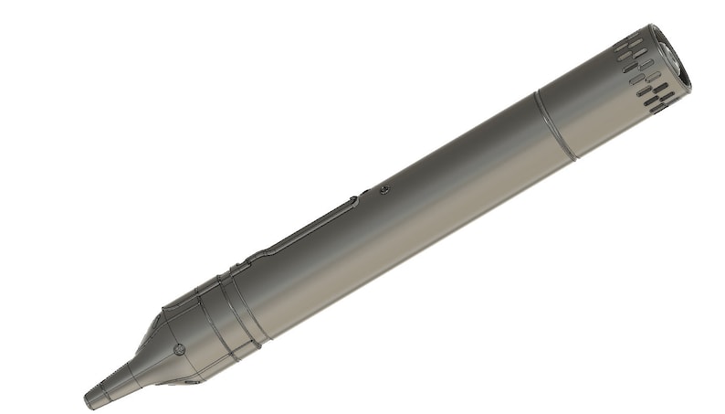 May include: A silver-colored microphone with a cylindrical body and a grill at the end. The microphone has a pointed end and a small hole on the side.