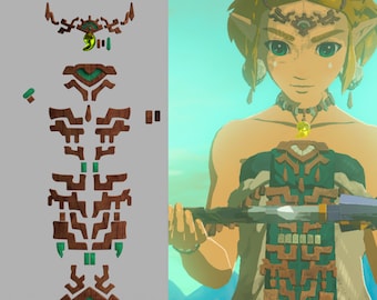 Puede incluir: Un conjunto de joyas con temática de Zelda que incluye un colgante verde, un collar con una gema verde y un colgante largo con una gema verde y un diseño de madera marrón.