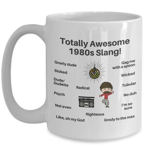 May include: White ceramic coffee mug with a black design featuring 1980s slang terms like "gnarly dude", "radical", "righteous", and "grody to the max".