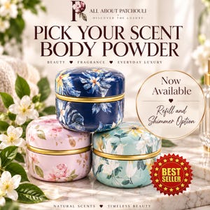 May include: Three round metal body powder containers with floral patterns in dark blue, light pink, and light green. Each features a gold-colored band around the center. Text includes PICK YOUR SCENT BODY POWDER, Now Available Refill and Shimmer Option.