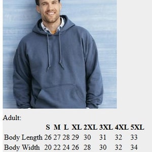 May include: A size chart for a Gildan Heavy Blend Hoodie. The chart shows the body length and width measurements in inches for adult sizes S to 5XL and youth sizes XS to XL.