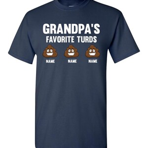 May include: A navy blue t-shirt with the text "Grandpa's Favorite Turds" and three cartoon poop emojis with the word "NAME" under each.