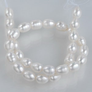 rice-shaped 10-11mm white freshwater pearl strands CDRC21