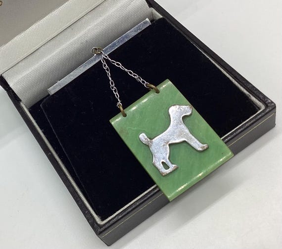 True Vintage Bar Brooch with Terrier Suspended on Green Lucite Tablet