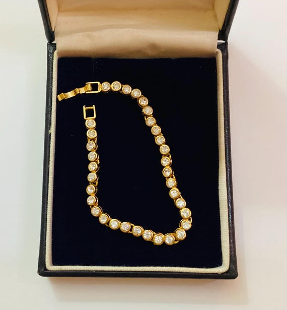 Gold Tone Crystal Tennis Bracelet: 1990s Glamour, 6 1/2 Inches