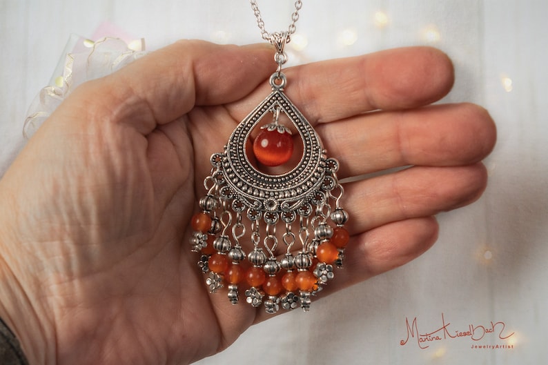 Long necklace with a large pendant and matching earrings made of orange cat/'s eye Necklace with earrings jewelry made of cat/'s eye
