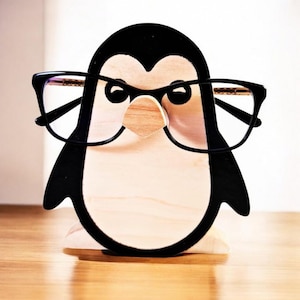 Penguin eyeglass holder store