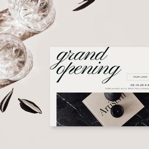 May include: An image promoting a grand opening, featuring elegant script. Two crystal glasses, decorative leaves, and a book with the word "Artists" are visible. The date and time are also displayed on the promotional material.