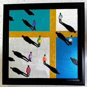 May include: Framed abstract art piece featuring silhouetted figures with long shadows. The artwork has a grid-like composition with teal, silver, and blue backgrounds, accented by gold lines. The figures are painted in various colors.