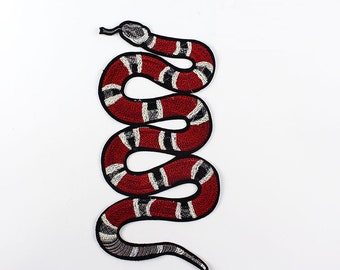 Cintura in pelle e fibbia doppia g con serpente gucci - Stileo.it