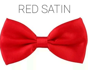 May include: A red satin bow tie.