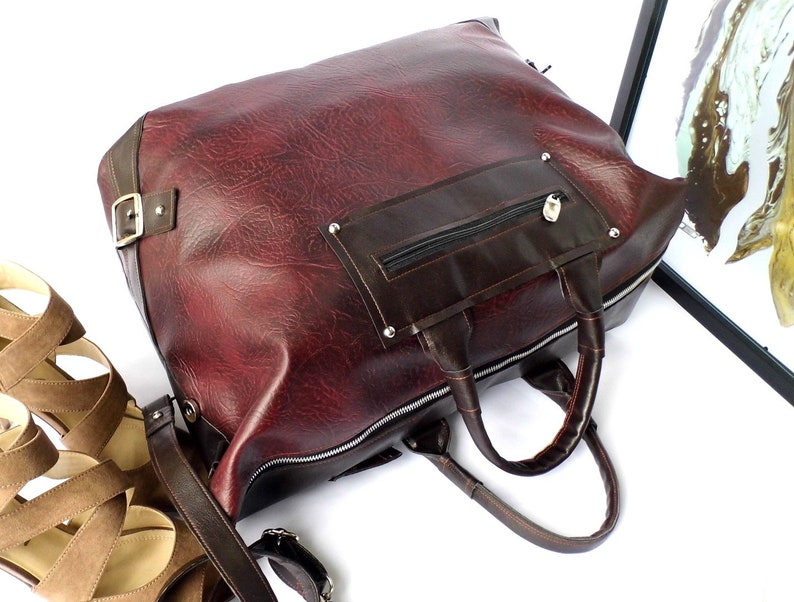 burgundy book bag