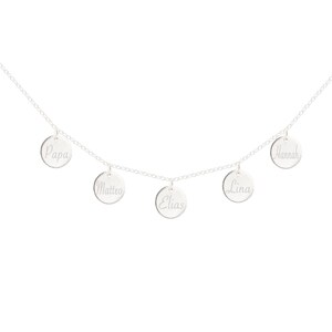 May include: Silver necklace with five round charms, each engraved with a name: Papa, Matteo, Elias, Lina, and Hannah.